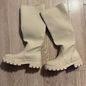 Knee high combat boots